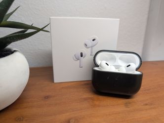 Airpods Pro 2 with green leather case