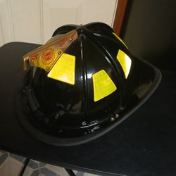 Fireman helmet One size fits all 300 Hundred   Dollars 