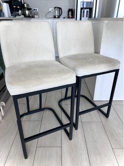 2 white bar stools