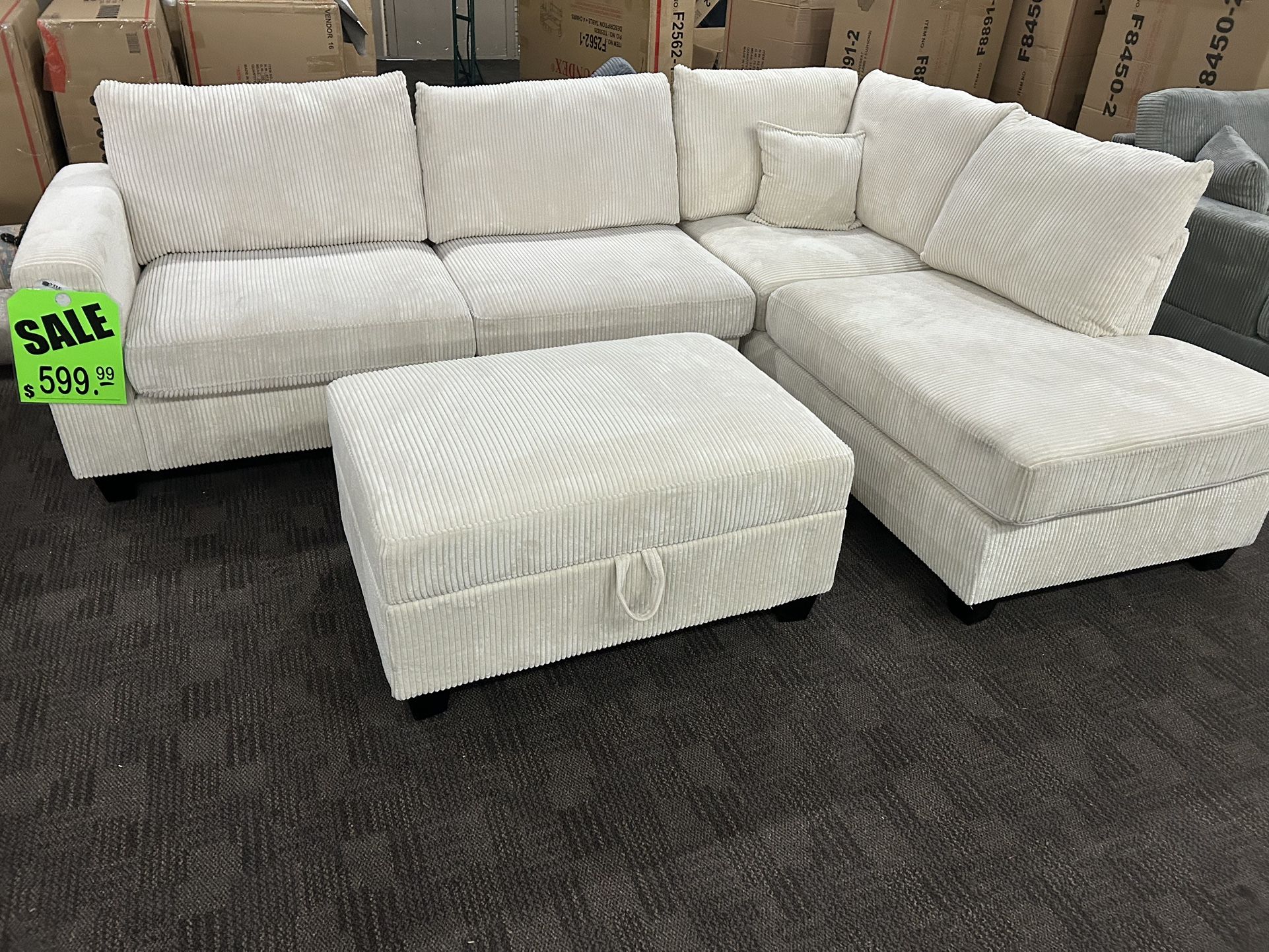 Cream Sectional W/ Storage Ottoman