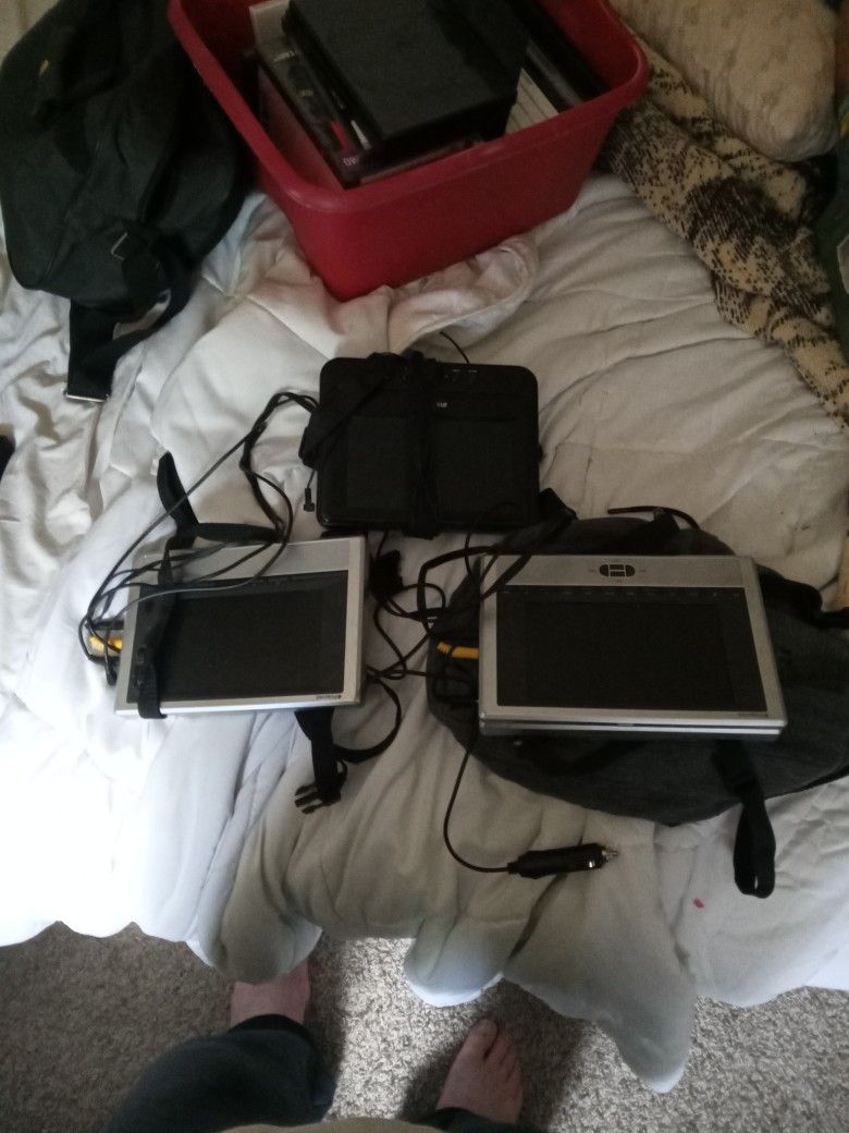 CAR. DVD PLAYERS, POLAROID, SYLVANIA. 3 OF THEM