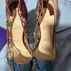 Authentic  Christian Louboutin (red Bottoms)