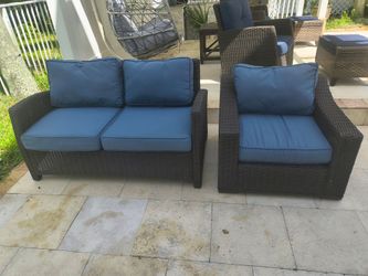 Outdoor wicker sofa and chair