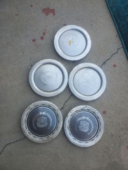 Cadillac Fleetwood or deville center caps see Pictures