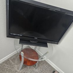 Vizio 32' Smart TV And Round Glass Side Table