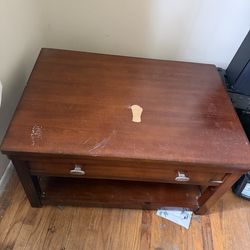 Coffee table with retractable table