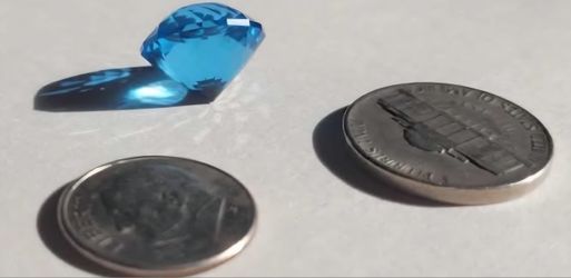 Electric blue topaz, loose stone, 12.79 carats