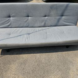 Nice clean twin futon that contorts in many positions...measures flat 40 by 74 and  32 high