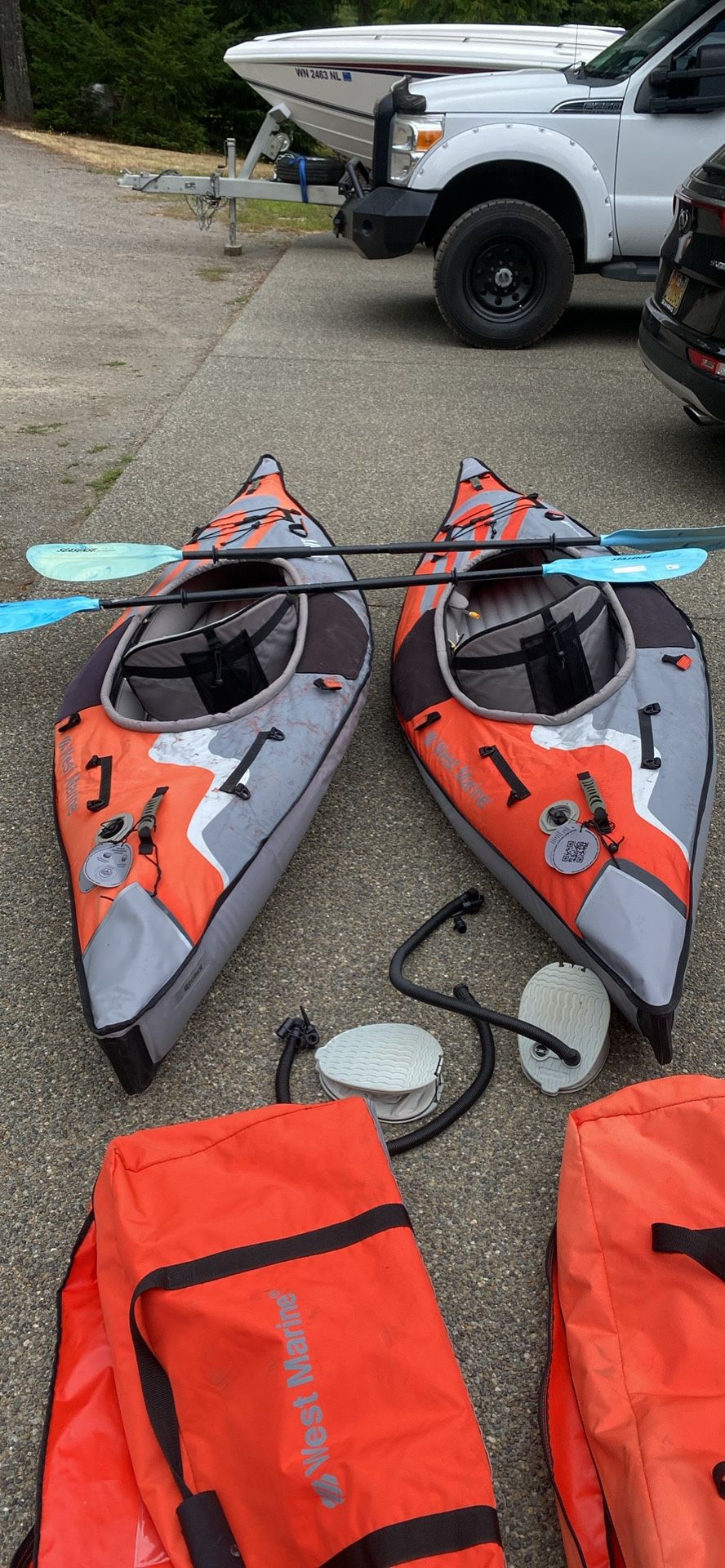 2 West Marine Advanced Elements Scout Inflatable Kayaks With Paddles