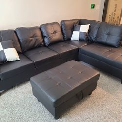 Brand New In box Black Faux Leather Sectional With Storage Ottoman And Pillows