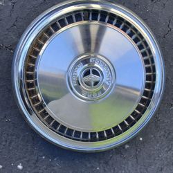 Four Vintage Ford Hubcapa 