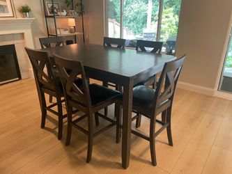 Bar height table with chairs