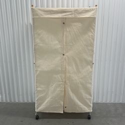 Covered Clothing Rack on Wheels