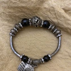 Made with love. Silver and black bead fashion jewelry. Stretch bracelet. Heart charms. Rhinestones. 