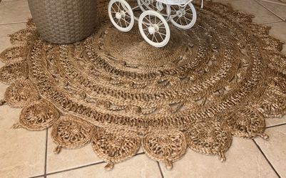 Large round woven natural fiber Jute rug