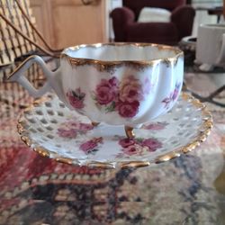 vintage, footed teacup and saucer set 