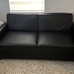 Sofa Bed , Black Leather . Price Including Delivery 