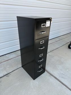 4 Drawer Filing cabinet WITH key  Pick up in Deer Park Tx 77536