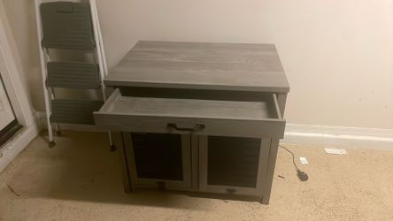 Newly assembled dog kennel, solid wood top