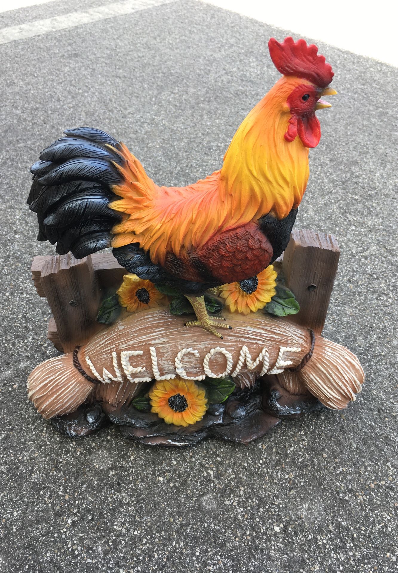 Rooster with welcome sign. Garden decor realistic color