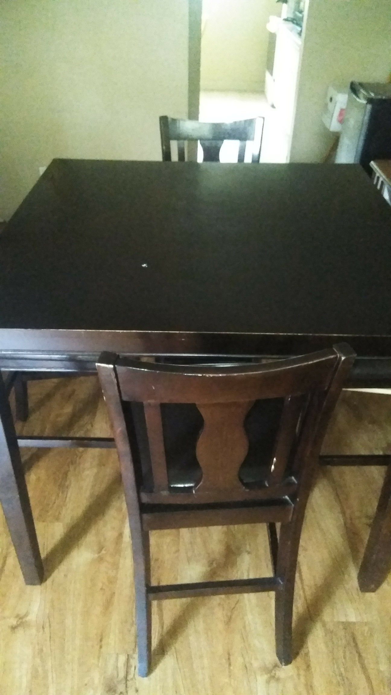 Brown wooden for sale with 4 chairs