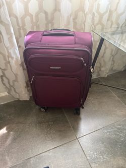 Samsonite Purple Softside Spinner Luggage hamd carry