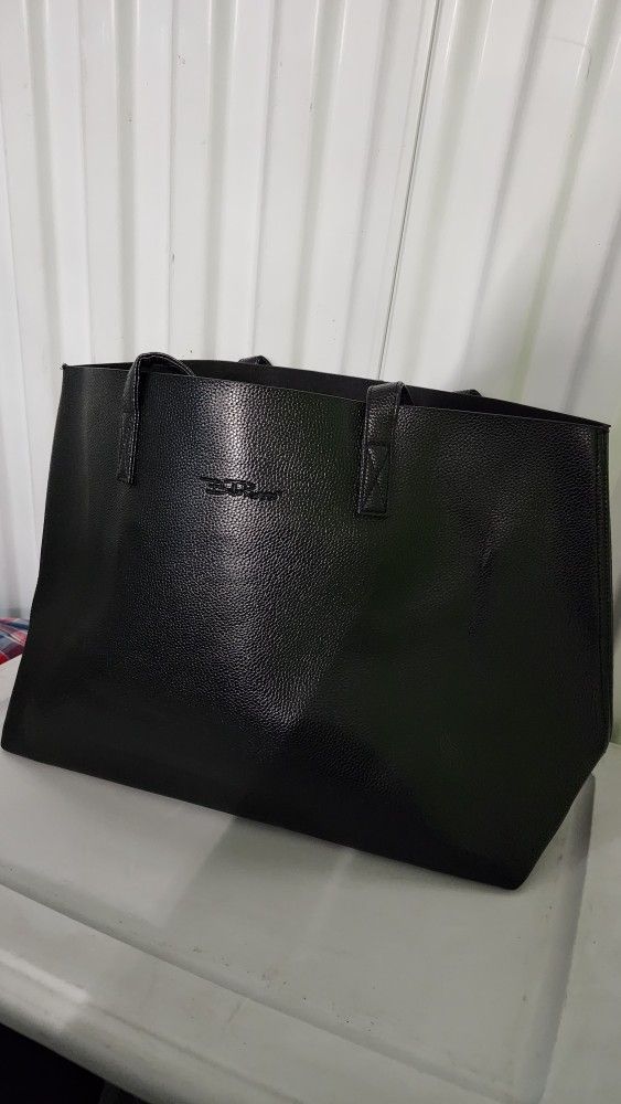 leather tote bag by Bella russo
