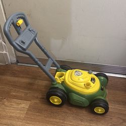 Lawn mower bubble machine toy