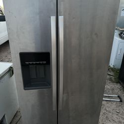 Whirlpool Refrigerator / Freezer Stainless Side by Side with Ice and Water