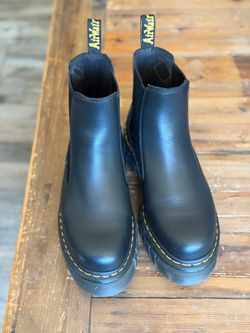 Doc marten high platform boots.