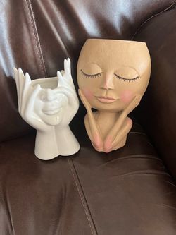 Face Vases. (1, ceramic & 1 composite)