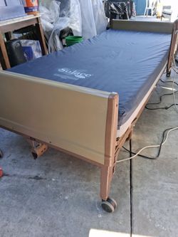 Full electric invacare hospital bed