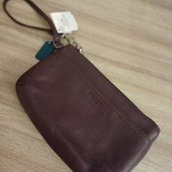 Plum Coach Wristlet New With Tags