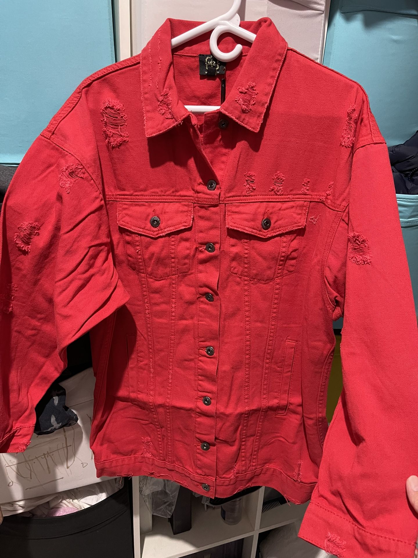 DISTRESSED DENIM JACKET SIZE MEDIUM