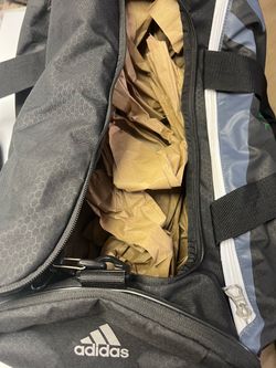 Adidas Team Issue Large Duffel Bag This adidas Team Issue Large Duffel Bag gives you top-to-bottom functionality in a tough, travel-ready design. With