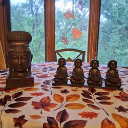 Head statue and Buddha candle holder