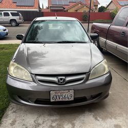 2004 Honda hybrid gas-electric  (grey)