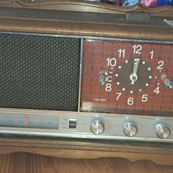 Vintage Radio, Clock, And Alarm. In Great Conditiin.  Used