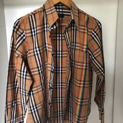 New plaid Burberry button up shirt available in medium and small