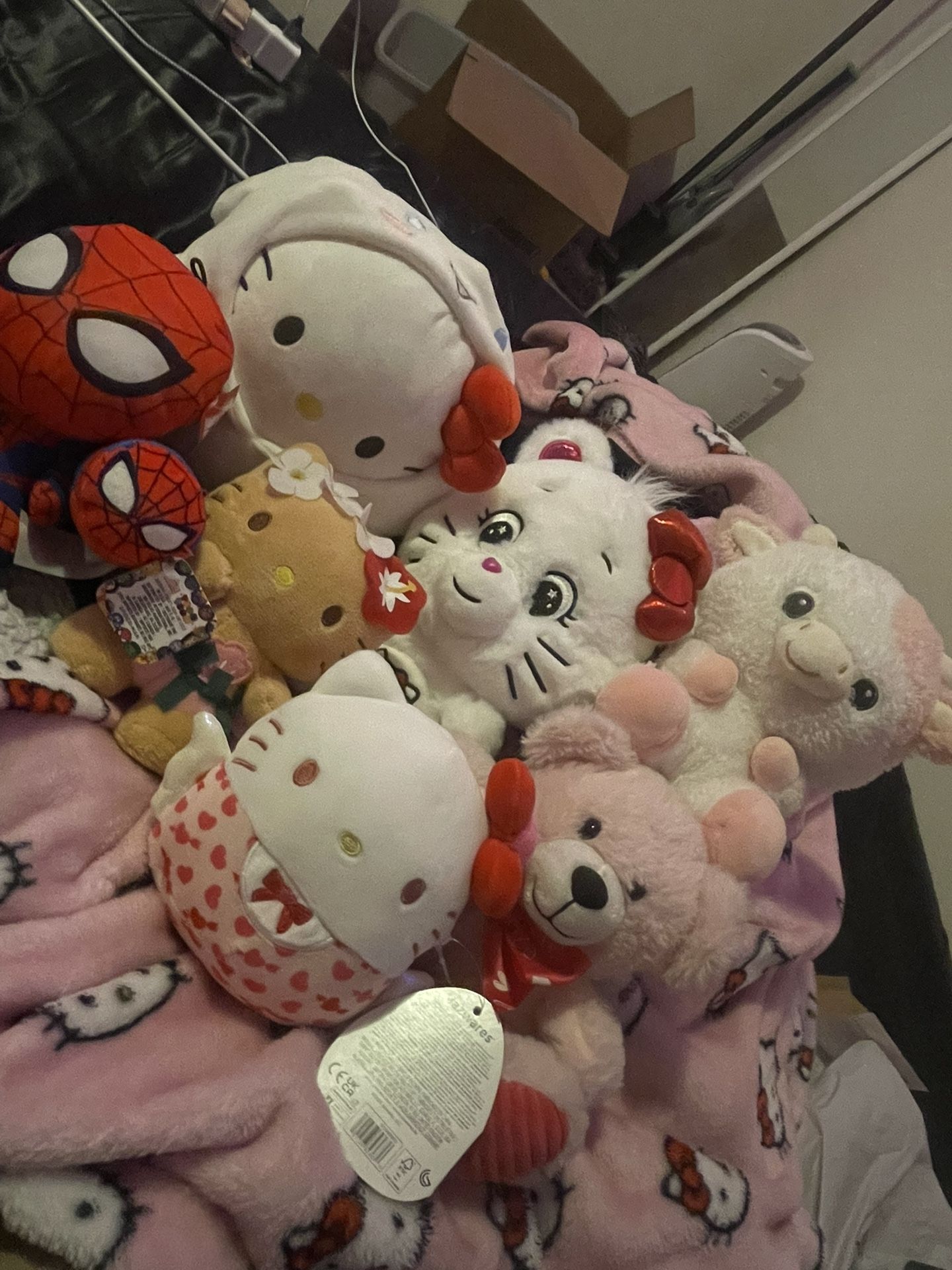 hello kitty and other mixed plushies