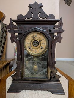 Antique Niagara Falls Trademark Mantle Pendulum Clock.  Walnut Wood & Operates.  Has A Half Hour Chime As Well