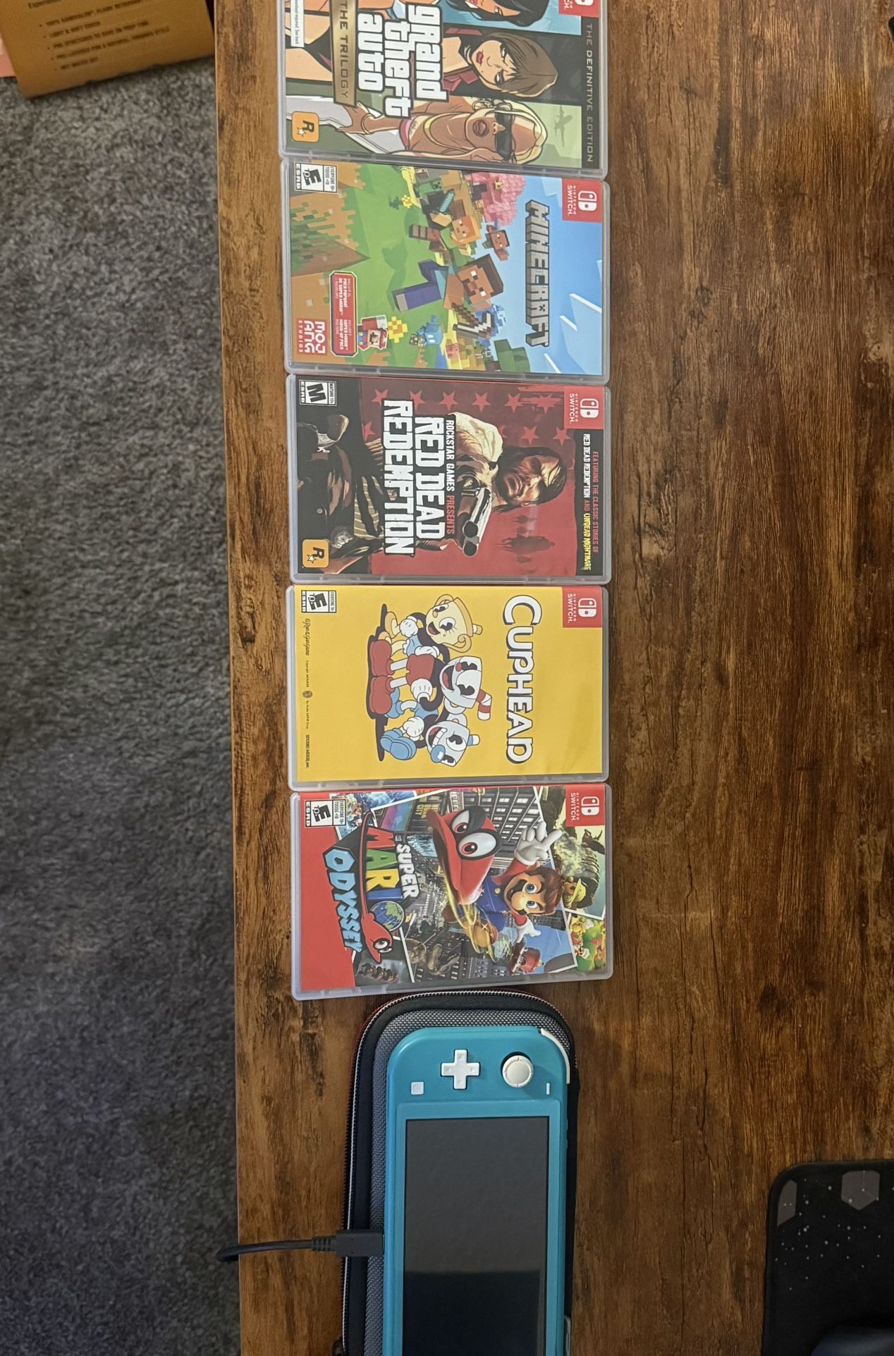 Nintendo Switch Lite + Games For Sale