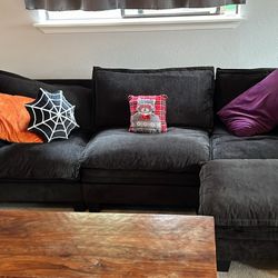 Black Modular Couch With Ottoman
