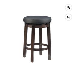 Linon Maya 25" Round Black Faux Leather Swivel Counter Stool in Dark Brown Wood
