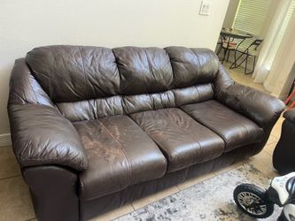 Brown leather  couch  with  leather table
