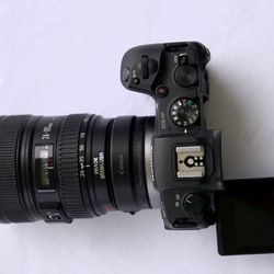 Canon RP with EF 24-105mm F/4L IS USM lens & canon EF 50 f/1.4. 