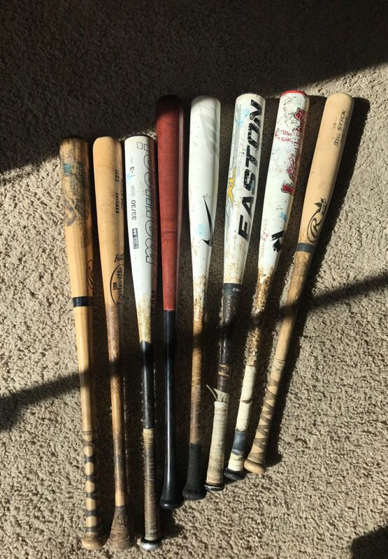 Metal and wood baseball bats