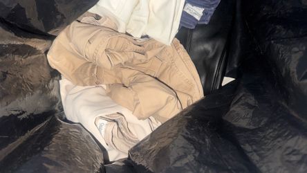 Bag of women’s jeans and slacks