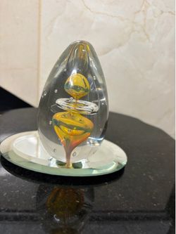 Art Cristal egg -shaped glass paperweight internal yellow swirl 4”