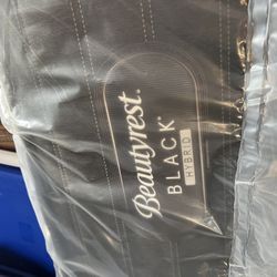 New Queen Mattress Still In Plastic Covering 